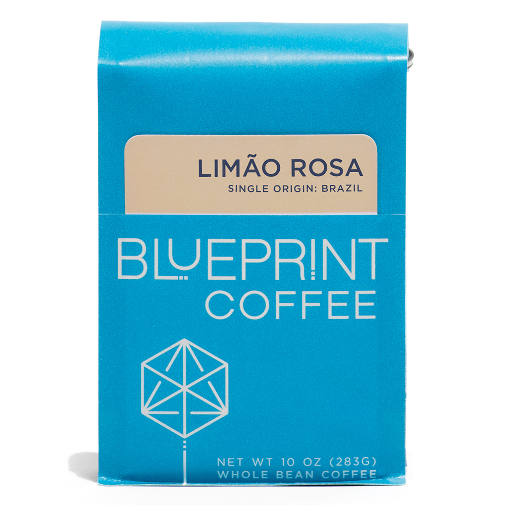 A blue 10-ounce bag of Limão Rosa coffee beans featuring the Blueprint Coffee Logo and a light tan removable info card.