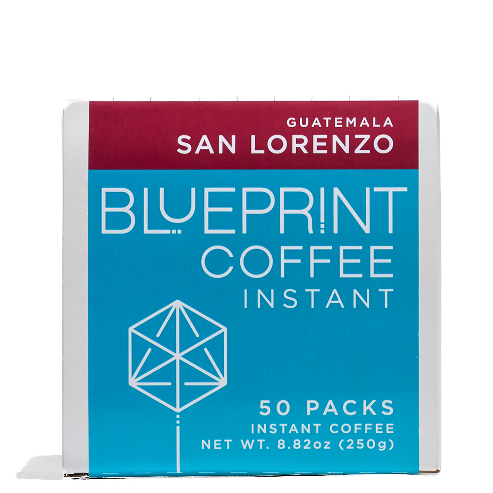 A white box containing San Lorenzo, Guatemala instant coffee roasted by Blueprint Coffee. The box features the Blueprint Coffee logo in blue and the coffee name in red.
